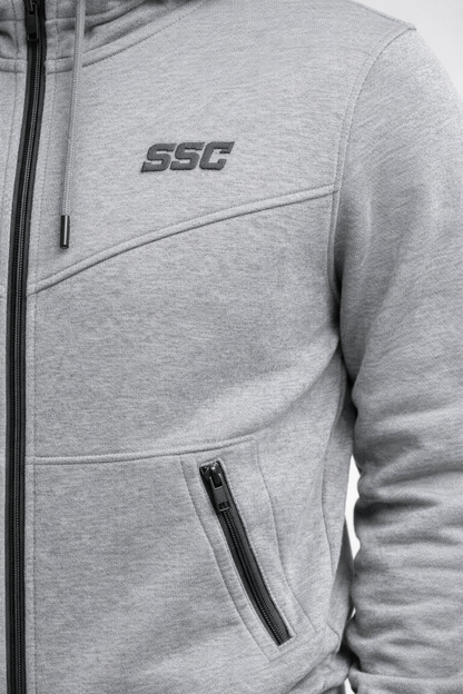 Gray SSC CORE Gray Tech Suit, hoodie chest panel and zipper pocket detail.