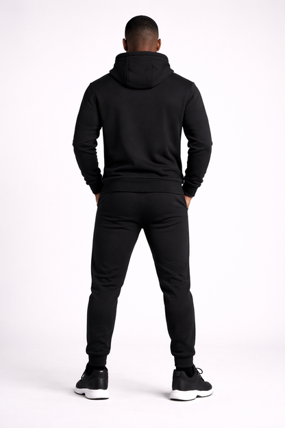 Black SSC CORE Black Tech Suit, back view of matching hoodie and joggers on model.