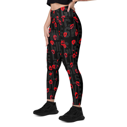 Black with red kiss print SSC Girls Love Swag Kiss Print Pocket Leggings, angled view on model.