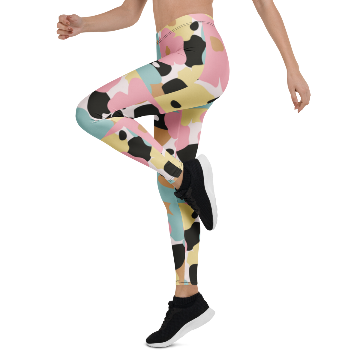 Model wearing SSC Pastel Camo Leggings in a movement pose